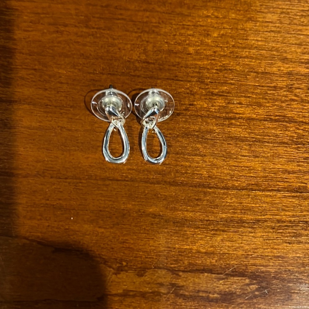 One pair of silver hoop earrings